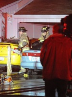 Attic fire, chainsaws. Photo credit: Luke Otterstad