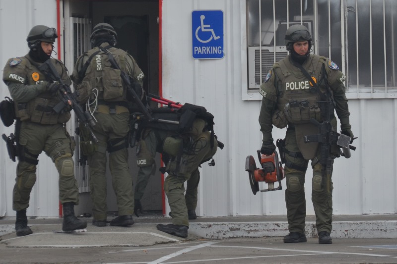 Breaking: heavy police activity, SWAT team at Auburn Blvd tire shop