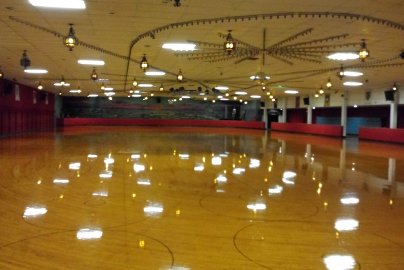 Interior roller rink at Sunrise Rollerland, located at 6001 Sunrise Vista Drive