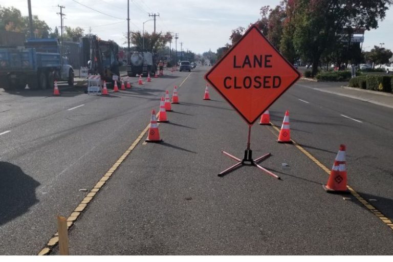lane closed road sign