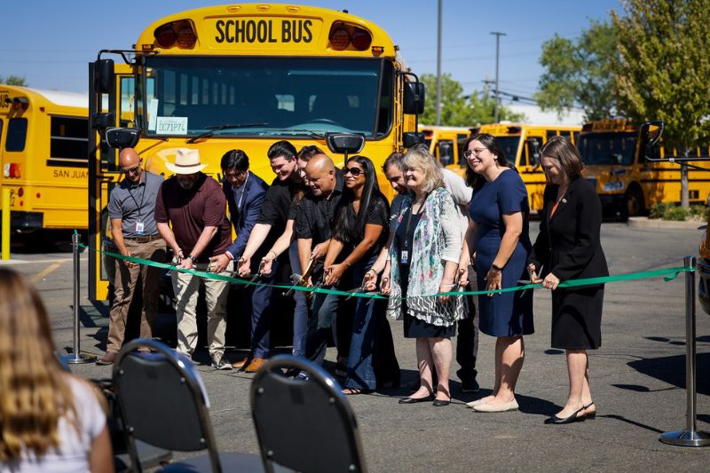 Several district and regional state leaders were in attendance at the unveiling of 6 new electric school buses on July 25, 2024. // Courtesy of San Juan Unified School District