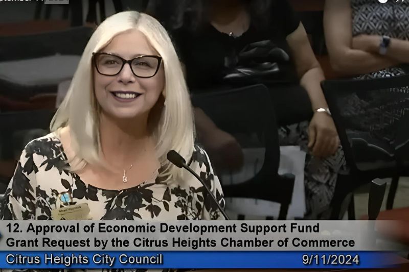 Sheri Merrick speaks at a city council meeting