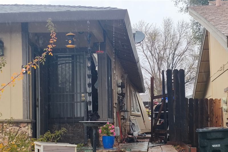 An explosion blew out part of the wall of a duplex unit on Trovita Way, Dec. 24, 2024.