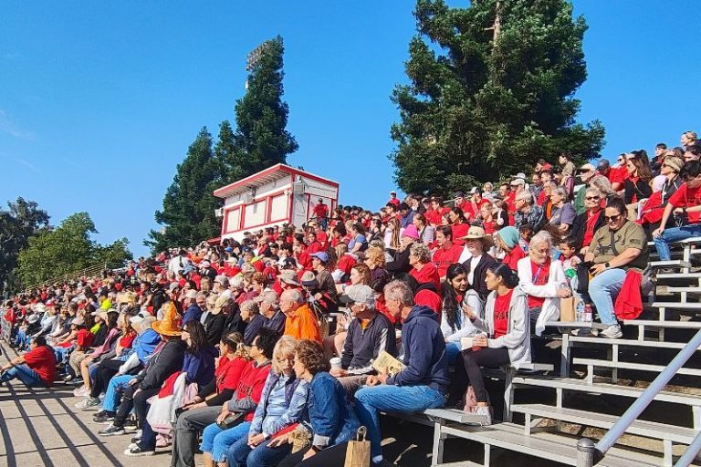 Hundreds gathered in red Big Day of Service t-shirts for a kickoff rally at Bella Vista, May 17, 2025.