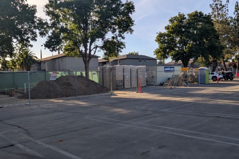 A set of new EV charging stations is being constructed in the parking lot of Best Buy off Birdcage Street. // SB Williams