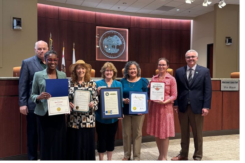 Renee Larscheid stands with the Citrus Heights City Council and City Manager holding proclamations given to her to honor her for 38 years of service to the Citrus Heights Chamber of Commerce. Wednesday, Aug. 27, 2025. // City of Citrus Heights